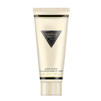 Guess Seductive Women Eau de Toilette 4 Piece Gift Set - Perfume Spray 2.5 Fl. Oz., Travel Size Perfume Spray 0.5 Fl. Oz., 3.4 Fl. Oz. Body Lotion, & Pouch