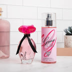 Guess Girl Eau de Toilette 3 Piece Gift Set - Perfume Spray 3.4 Fl. Oz., Travel Spray 0.5 Fl. Oz., & Body Lotion 6.7 Fl. Oz.