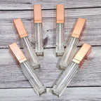 Mini Skater 6pcs 5ML Clear Empty Lip Gloss Tubes With Wand Reusable Refillable Travel Dispenser Bottle Vial With Rubber Stopper Cosmetic Container For Lipstick Balm Lip Glaze DIY Making (Rose Gold)